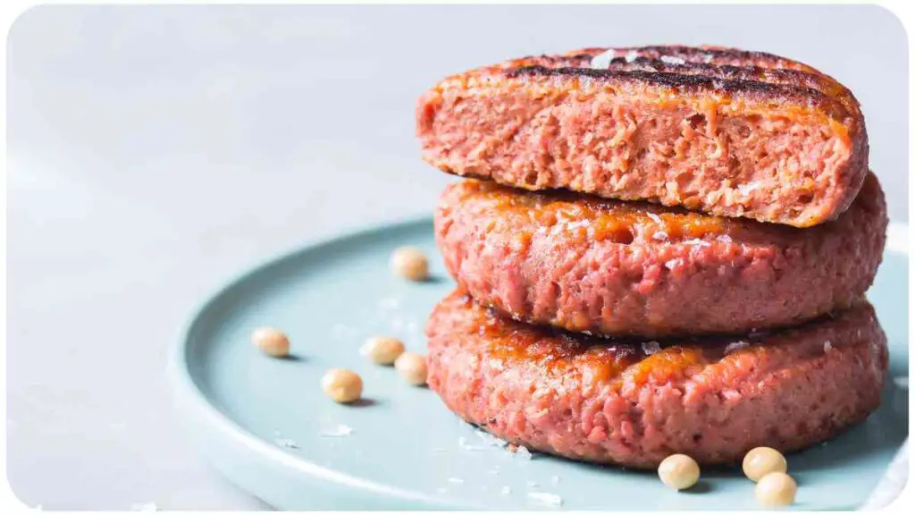 a stack of meat patties on a blue plate
