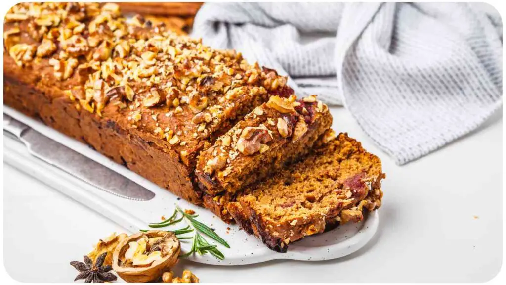 a loaf of bread topped with nuts and spices