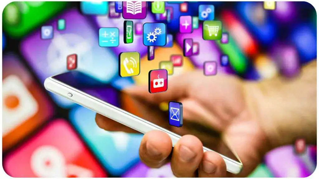 a person is holding a smart phone with many app icons coming out of it