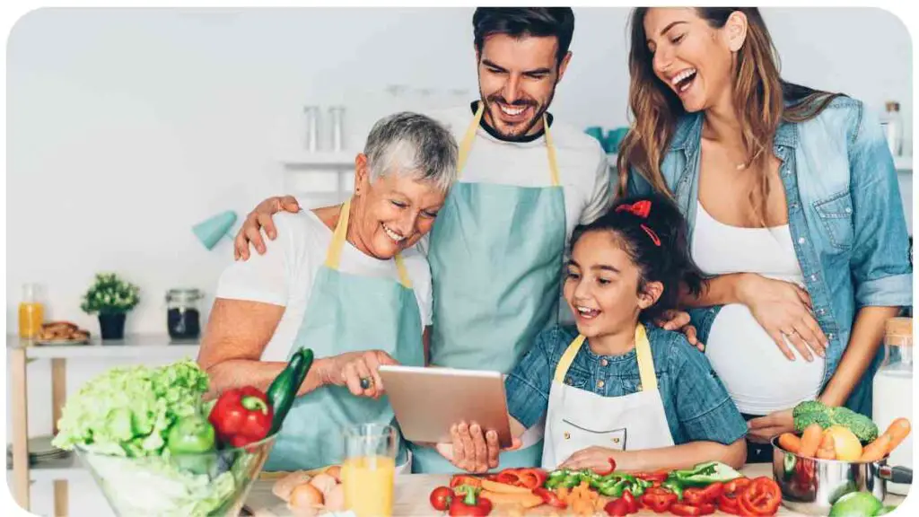 an image of a family in the kitchen with a digital tablet